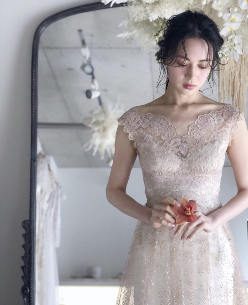 Lace wedding gown by Claire Pettibone