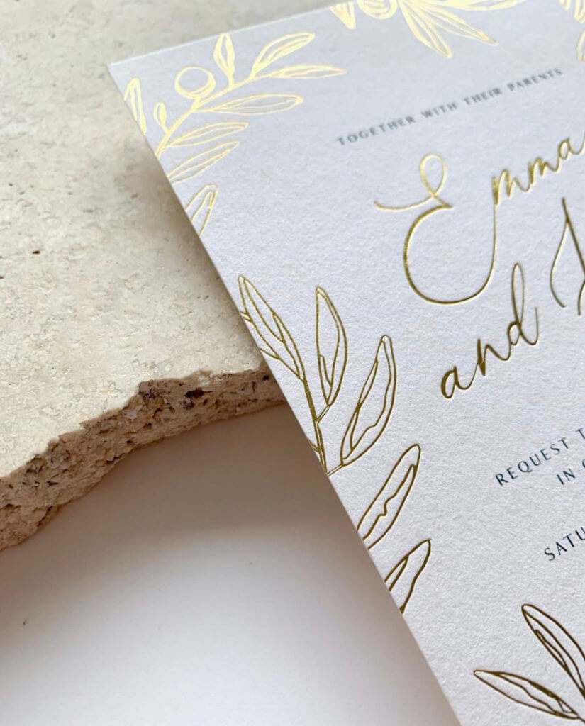 wedding invitation card with a gold twist