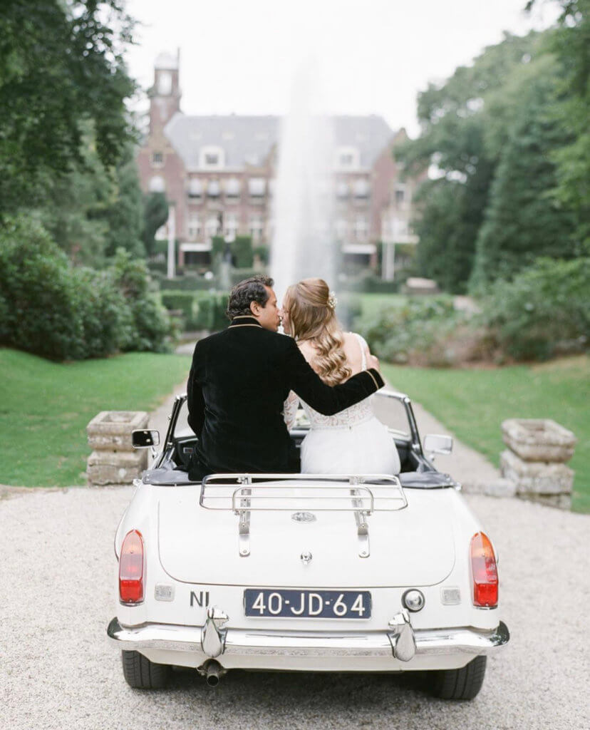 just married couple on a wedding car