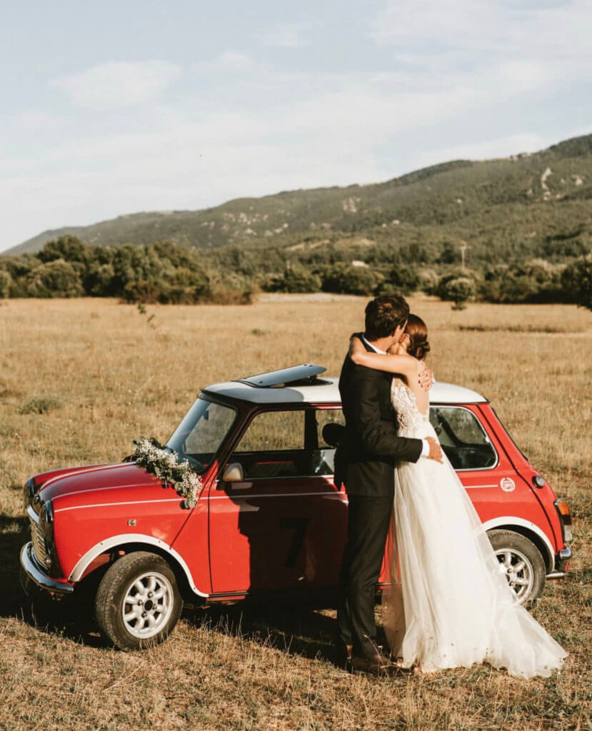 red classic mini cooper as wedding car